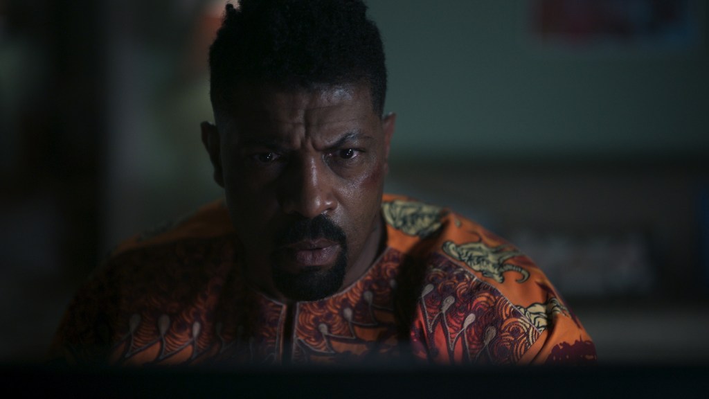 ‘Average Joe’ Is Back! Deon Cole & Michael Trucco Talk Taking The Chaos International For The Show’s Explosive Second Season